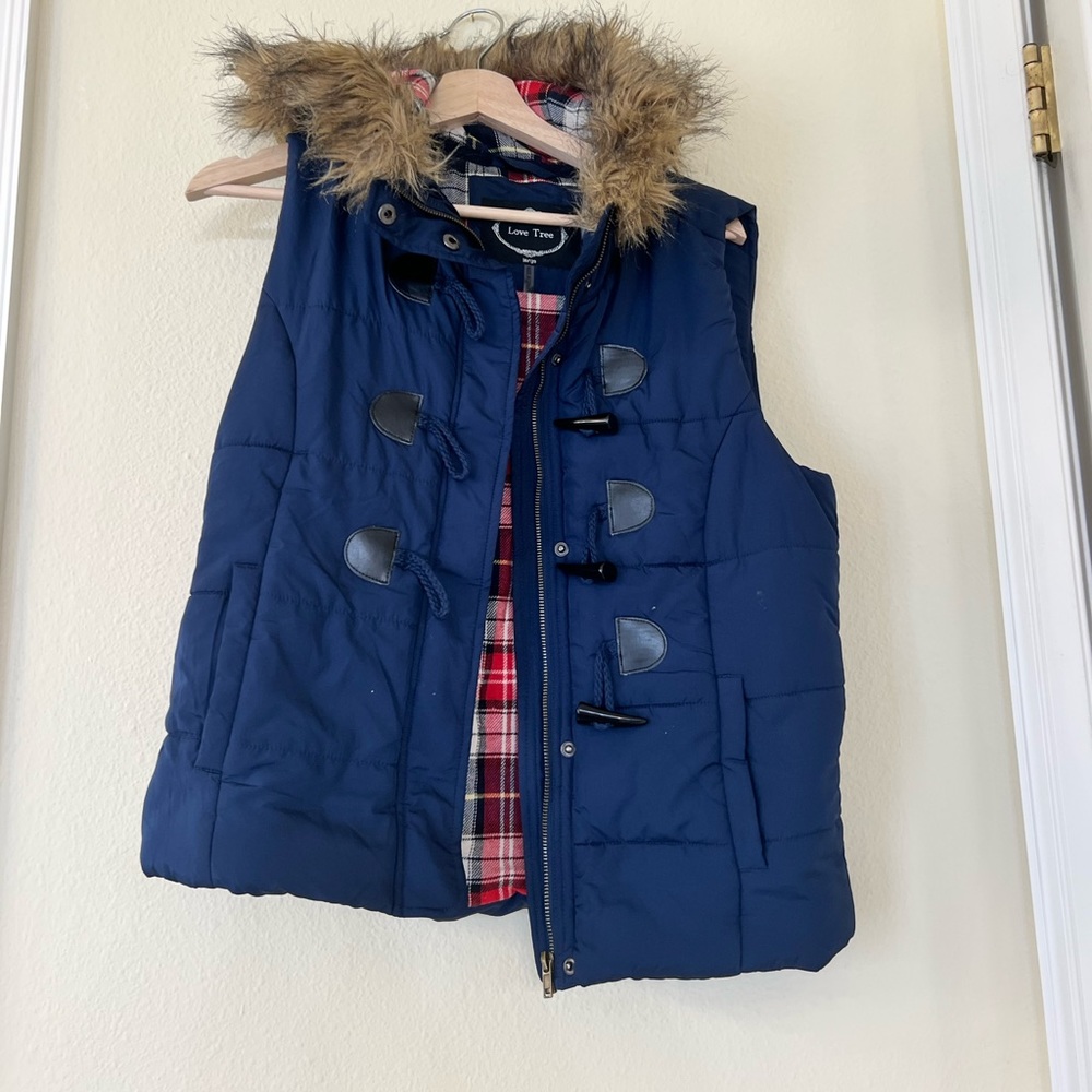 Navy vest with faux fur lined hood. Size L